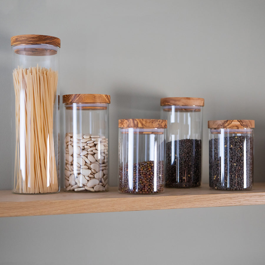 https://www.boroughkitchen.com/cdn/shop/products/berard-olivewood-glass-storage-jar-with-olivewood-lid-borough-kitchen_900x900.jpg?v=1677859331